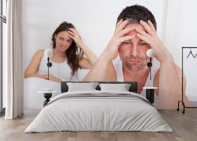 Frustrated Couple On Bed Wall mural