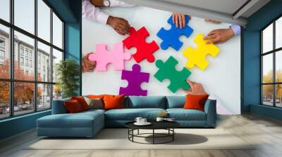 Group Of Businesspeople Solving Jigsaw Puzzle Wall mural