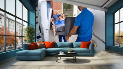 Happy Family Couple Watching Movers Unload Furniture Wall mural