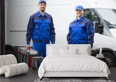 Happy Male Workers Holding Toolboxes Wall mural