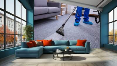 Male Janitor Cleaning Carpet Wall mural