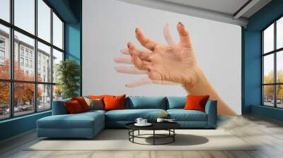 Person Hand With Dystonia Wall mural