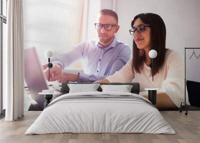 Two Businesspeople Using Laptop Wall mural