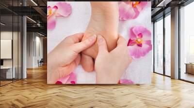 Woman's Feet Receiving Foot Massage Wall mural