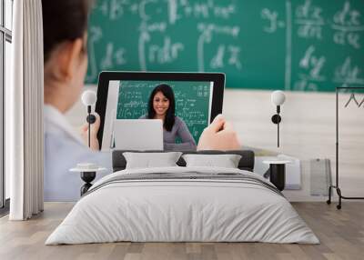 Woman Having Videochat With Digital Tablet Wall mural