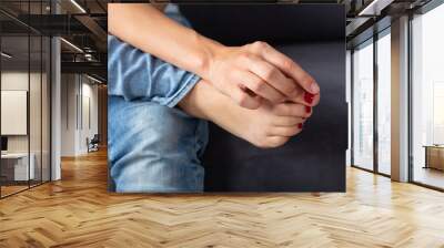 Woman Holding Painful Toenail Wall mural