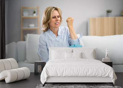 Woman Using Ice Gel Pack Wall mural