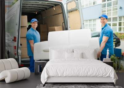 Workers Putting Furniture And Boxes In Truck Wall mural