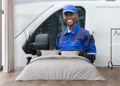 Young African Delivery Man Holding Digital Tablet Wall mural