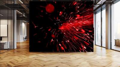 bright red sparks on black background Wall mural