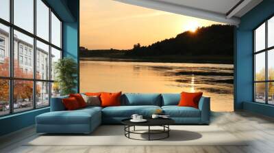 Sunny evening on the river in the countryside Wall mural