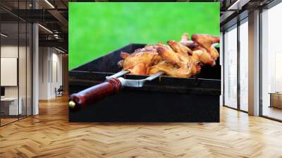 the chicken on the skewer over the coals. BBQ Wall mural