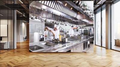 the work of the cook in the kitchen of the restaurant. Wall mural