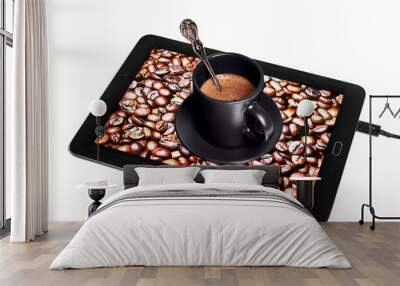 Hot morning coffee on a tray from a tablet. Wall mural