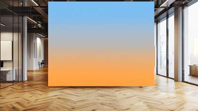 Twilight with orange gradient sunset and light blue sky background Wall mural