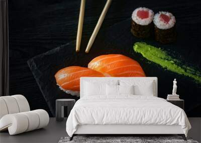 two sushi with salmon on stone Wall mural