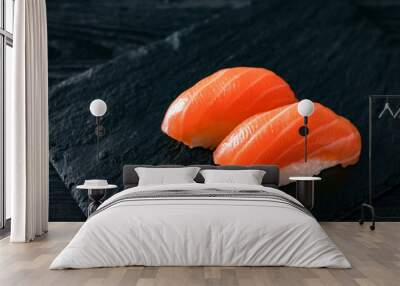 two sushi with salmon on stone Wall mural