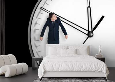 businessman hangs on an arrow of clock Wall mural