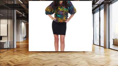  Young brunette woman in a black skirt and a colored blouse Wall mural