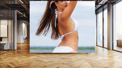 Close up portrait beautiful sexy brunette woman in white bikini Wall mural