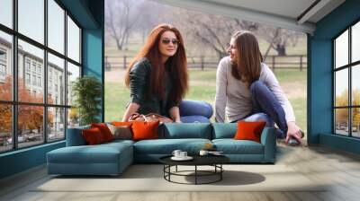 happy young women on field in summer Wall mural