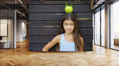 picture of beautiful girl with green apple Wall mural