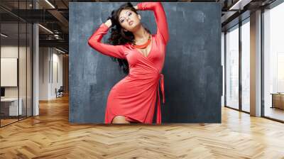 Portrait of beautiful woman in red sexy dress Wall mural