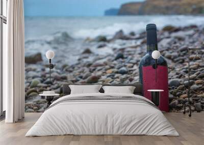 Bottle of wine by the sea Wall mural