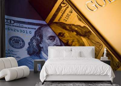 A bar of gold and a hundred-dollar bills. Wall mural