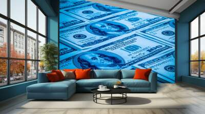 The background of a one hundred dollar bill. Style blue light. Wall mural