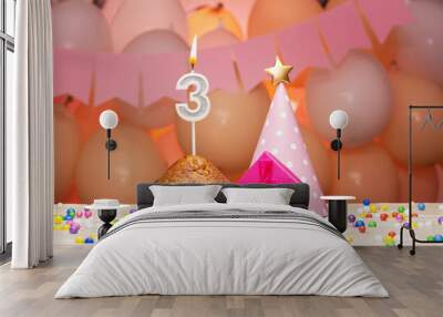  Decorations with balloons and a happy birthday candle with the number 3 years old for a child. Happy birthday greetings in pink colors for a three year old child for a girl, save space. Muffin Wall mural