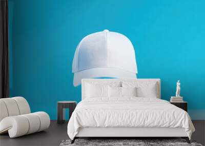 Modern Branding Mockup: White Cap on Blue Wall mural