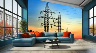 High voltage electricity pylons and transmission power lines on the blue sky background. Wall mural