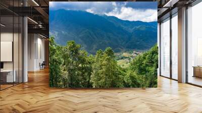 Beautiful scenery, popular tourist trekking destination. Rice field terraces.  Mountain view in the clouds. View from the funicular Sapa, Lao Cai Province, north-west Vietnam. Wall mural