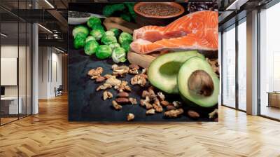 Food with natural vitamin Omega 3 and unsaturated fats. Concept of healthy vegan food on dark background Wall mural