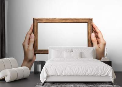 Hands holding wooden frame isolated on a transparent background. PNG file. Wall mural