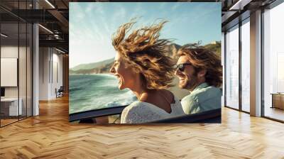 Happy smile couple man and woman traveling in car convertible the coast on summer sunny day. Wall mural