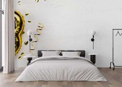 golden foil balloon number three. Birthday or anniversary card with the inscription 3. gray concrete background. Wall mural