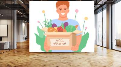 Man holding box with food donation, ready to help people in need. Help and care for people in need with different food. Flat vector illustration in green colors in cartoon style Wall mural