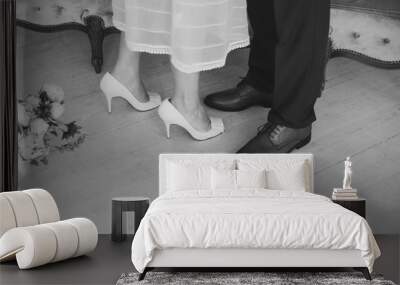 Black and white image of loving couple of man and woman during their wedding day. Horizontal color photography. Wall mural