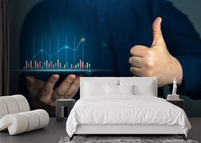 Businessman showing growth charts and thumbs up. Success in business and economics. Successful investments. Income growth and economic development. Optimistic forecast. Entrepreneurship. Wall mural