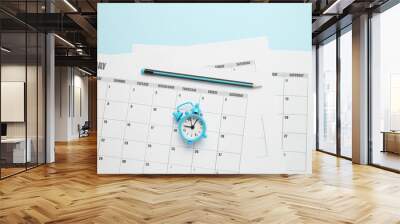 Business calendar, pencil and clock. Date reminder, office schedule. Wall mural