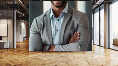 Handsome and successful businessman with a stylish smile, exuding confidence and positivity in an elegant suit. Wall mural