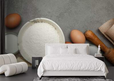 Variety of ingredients for baking on grey background. Wall mural