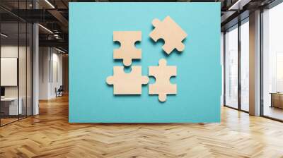 wooden puzzles, solving problems in business. innovation and teamwork in company. Wall mural