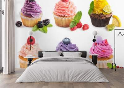 Collection of bright cupcakes with fresh berries isolated Wall mural