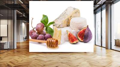 Soft cheese with honey, grapes and figs isolated on white Wall mural