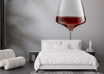 Red wine in a glass isolated on white background, copy space Wall mural