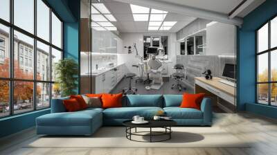 Contemporary dental clinic with light interior and hi-tech equipment Wall mural