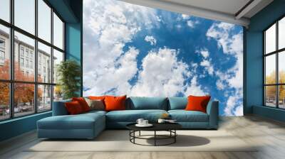 Vertical skyscape of blue sky background with clouds Wall mural